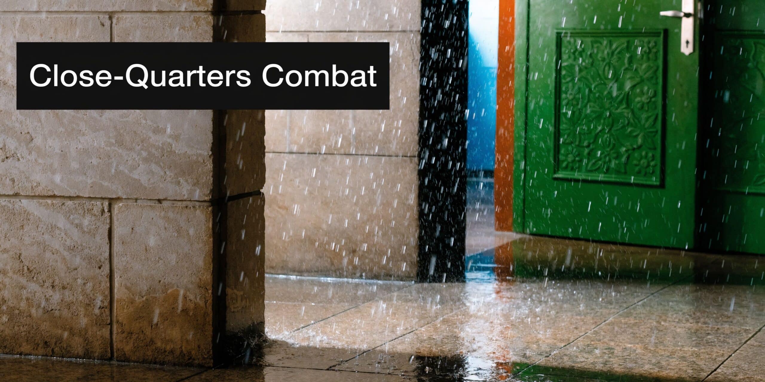 A view through an open doorway showing heavy rain falling on an outdoor patio floor.