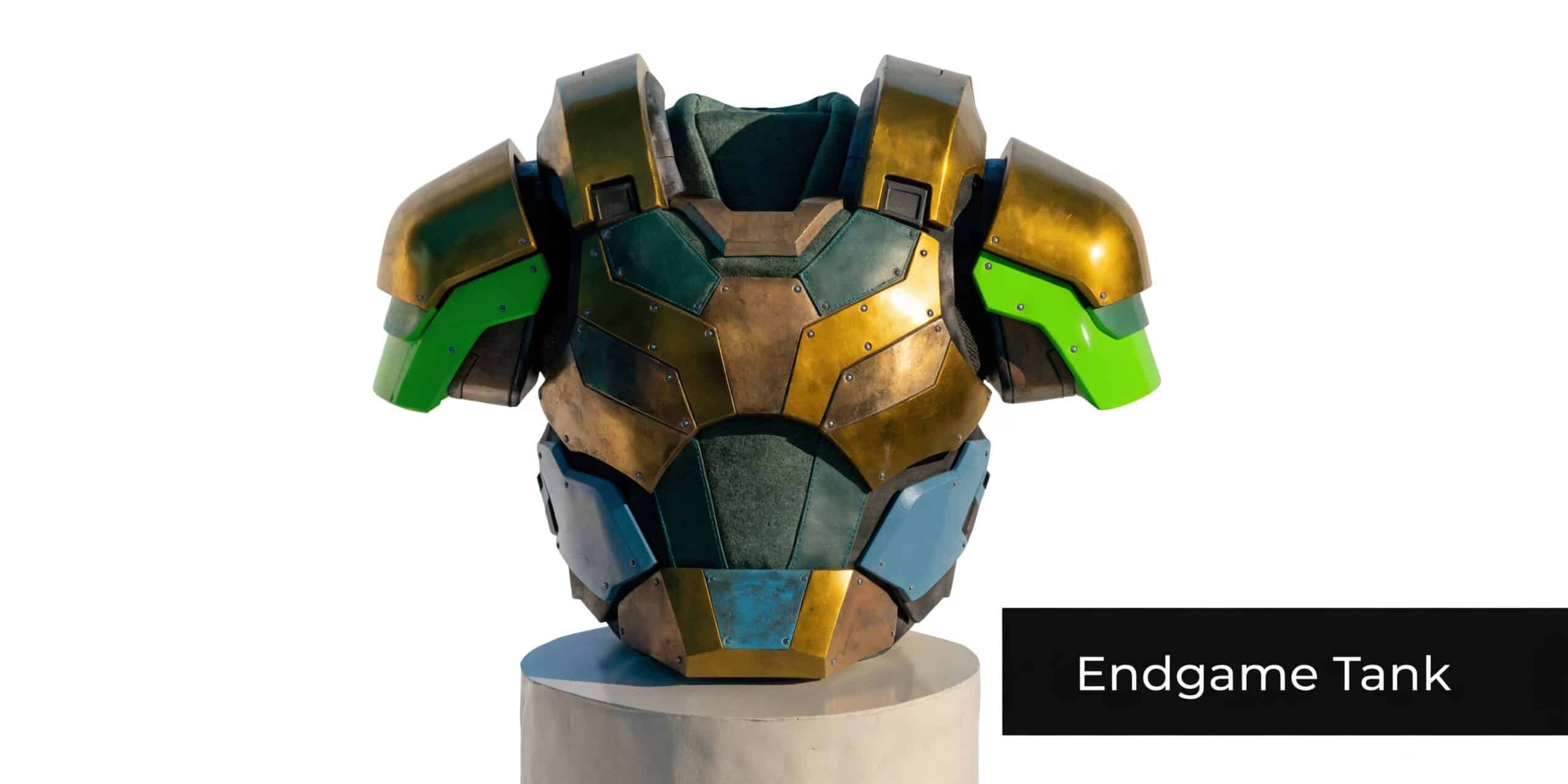 A custom-made piece of sci-fi style tactical armor featuring gold, blue, and green plating on a pedestal.